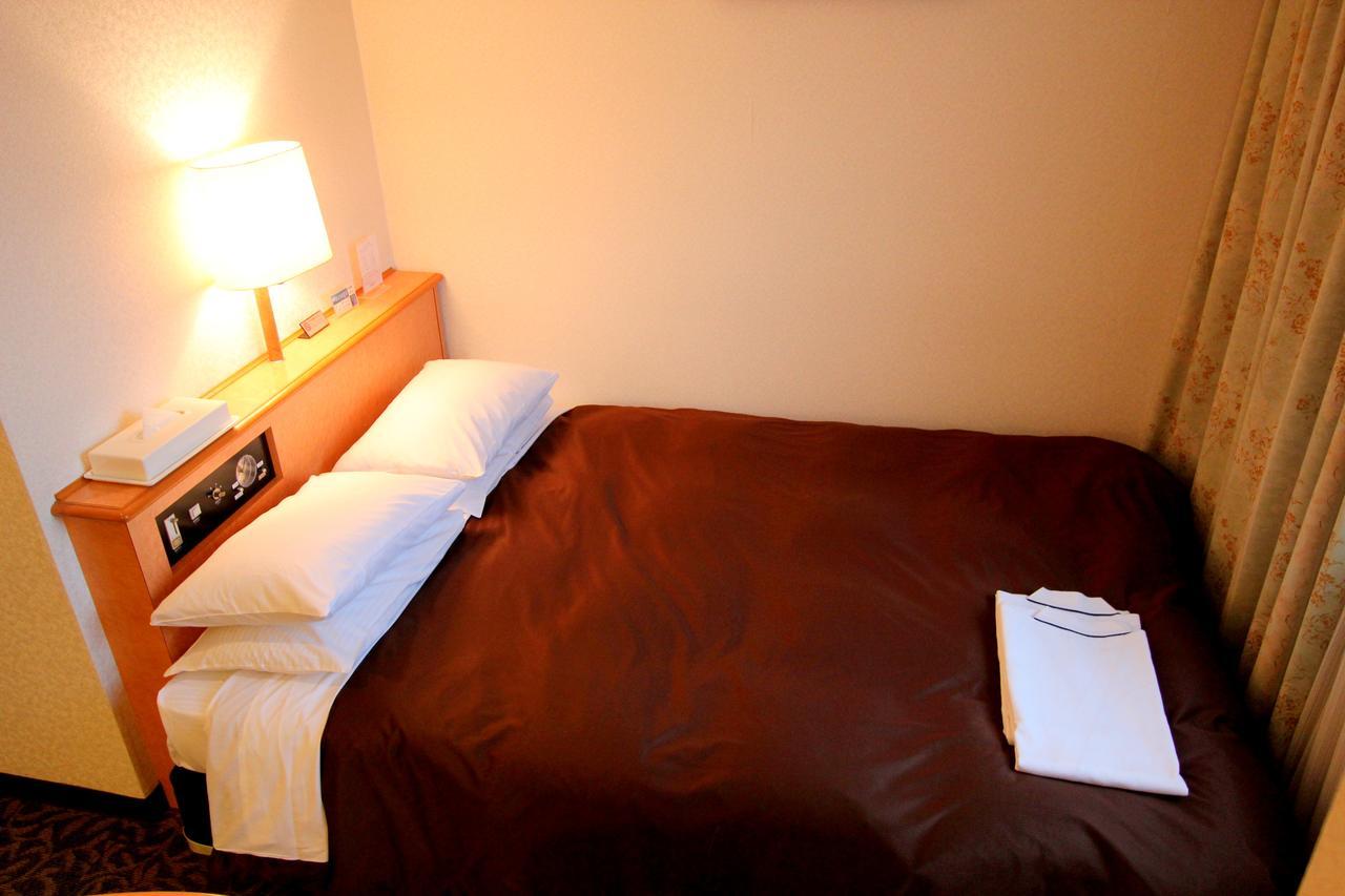 Hotel New Gaea Oitaekimae Bagian luar foto